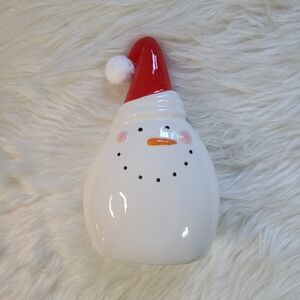 Festive Snowman Holiday Decor with Santa Hat